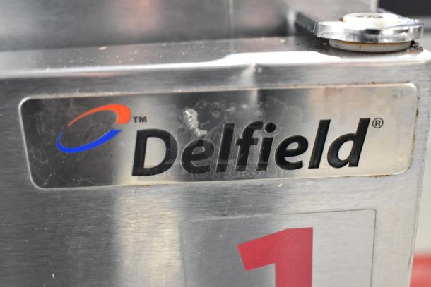 Delfield 406CA-DD1 stainless steel cooler with visible logo. Single door, 115V, 1 phase. Suitable for commercial use.