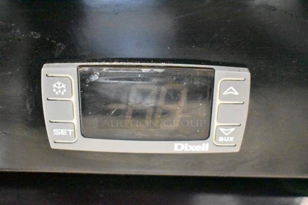Control panel of Cooler Depot LG-1000BF commercial cooler, featuring Dixell digital thermostat with buttons for settings and temperature display.