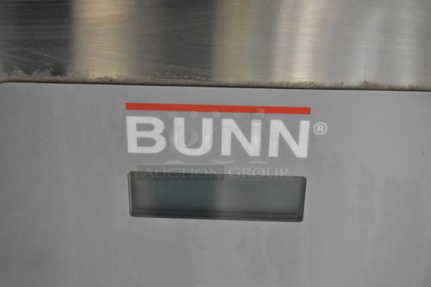 Bunn stainless steel commercial cappuccino machine, 120/208-240 volts, featuring Bunn branding on the control panel.