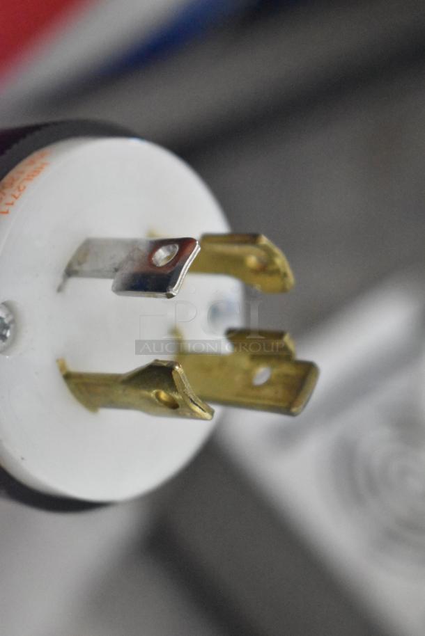 Close-up of the plug for a Bunn Stainless Steel Commercial Cappuccino Machine, 120/208-240 volts.