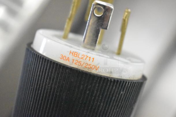 Close-up of plug for a Bunn Stainless Steel Commercial Cappuccino Machine, marked "HBL2711 30A 125/250V".