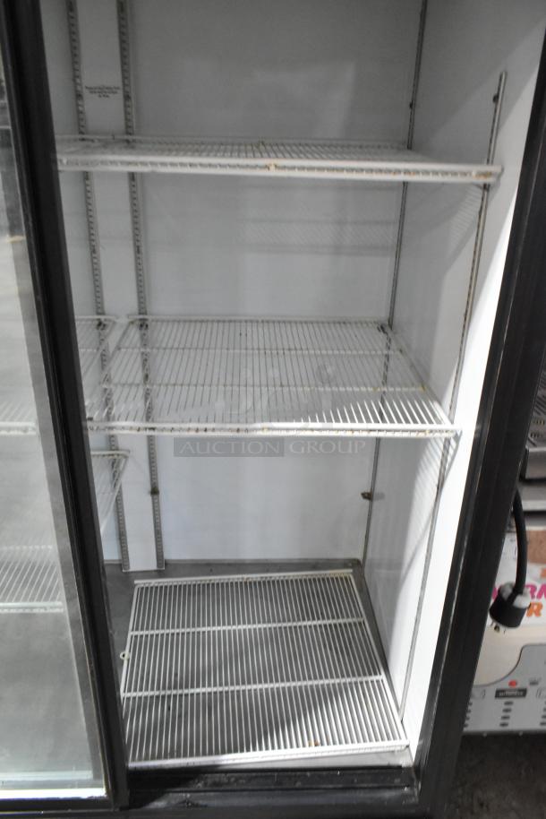 Beverage Air MT45 metal commercial 2-door reach-in cooler with poly-coated racks, good condition. 115V, 1 phase.