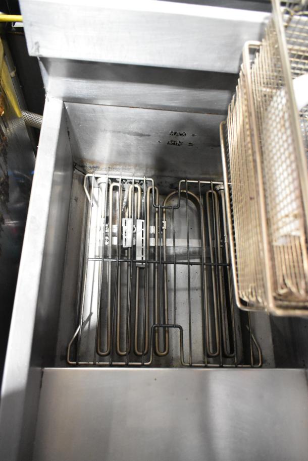 2020 USR Cookline SR114E stainless steel commercial electric fryer, includes 2 metal baskets, 240 volts, used condition.