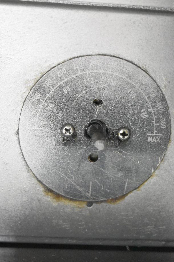 Close-up of the temperature dial on a 2020 USR Cookline SR114E stainless steel commercial fryer, showing degree markings.