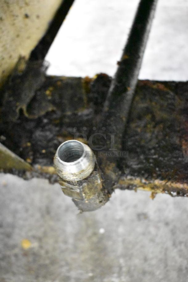 Cookrite stainless steel gas deep fryer, commercial-grade, showing a close-up of a metal connector.