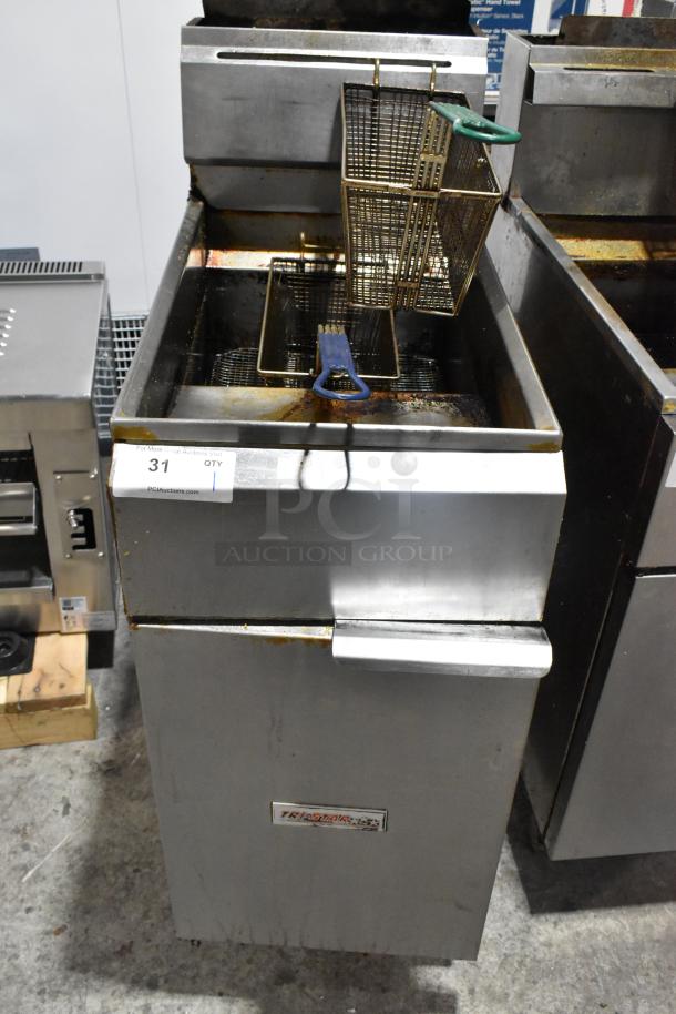 Tri-Star stainless steel commercial gas fryer with 2 metal fry baskets, visible wear, model label on front.