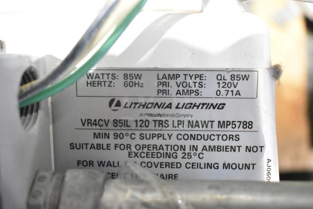 Label on Lithonia Lighting fixture, 85W, 120V, QL lamp type, for wall or ceiling mount, suitable for ambient under 25°C.
