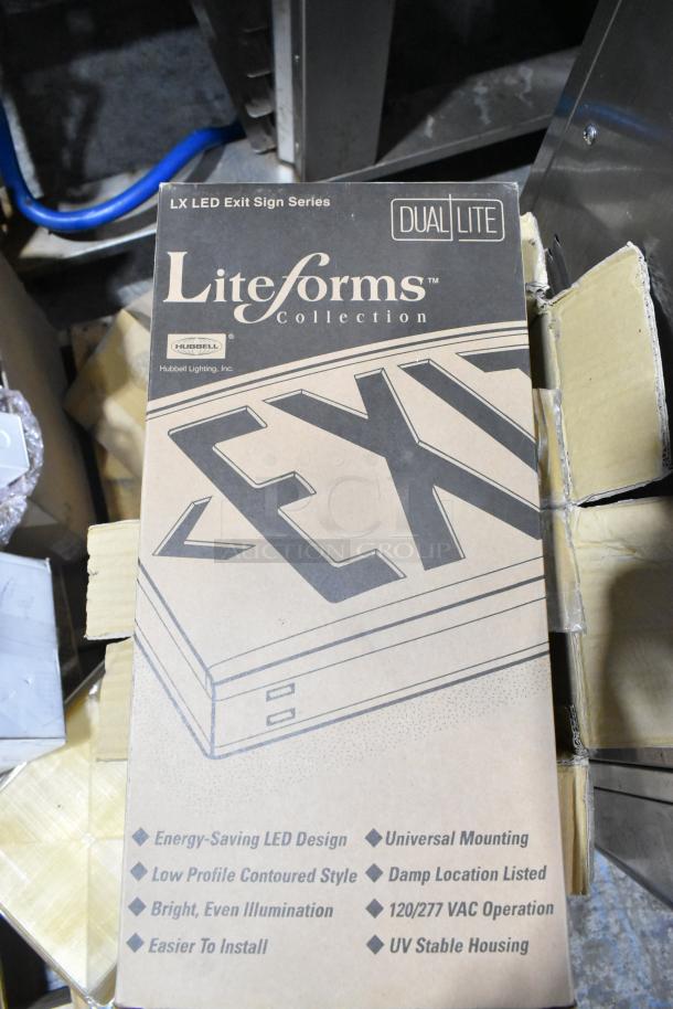 Pallet lot of various light fixtures, including Dual-Lite LX LED exit sign. Features energy-saving LED, universal mounting, 120/277 VAC.