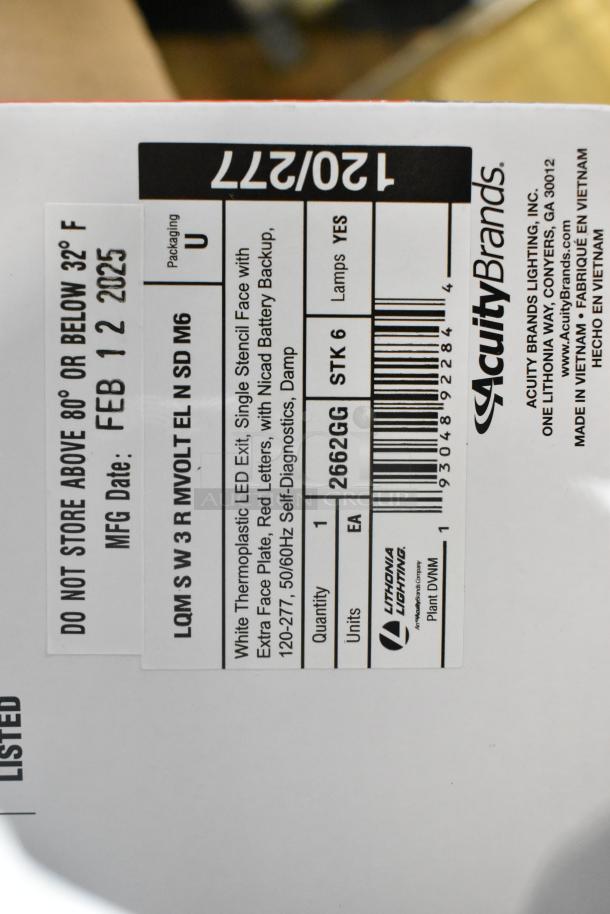 Pallet lot of various light fixtures, including emergency light. Acuity Brands label showing model LQM S W 3 R MVOLT EL N SD M6.