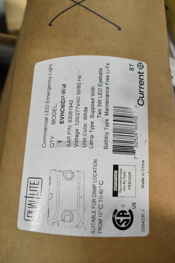 Pallet lot of various light fixtures including commercial LED emergency light, model EVHC6IDP-W-M, voltage 120/277V AC.