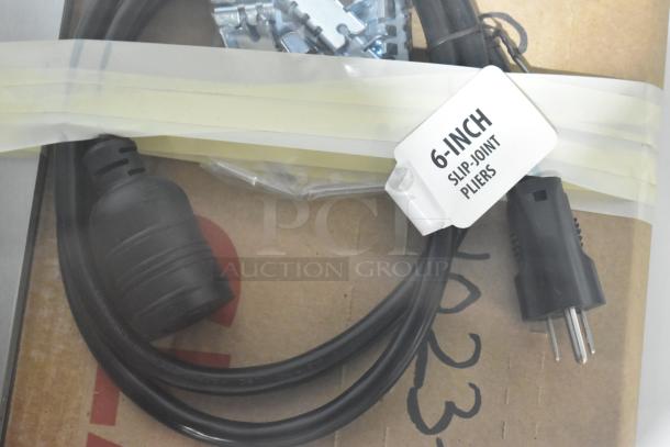 Power cord for WM19SGMOD Display Case Merchandiser, 120 volts, with slip-joint pliers tag, showcasing included accessories.