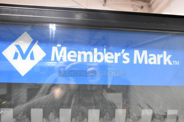 Crane 5800-4 metal vending machine, 115 volts, 1 phase, features Member's Mark branding on front glass.