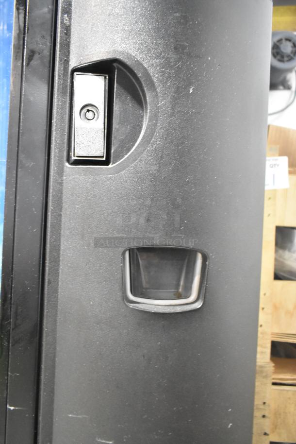 Crane 5800-4 metal commercial vending machine, 115V, 1 phase. Visible dispenser slot and lock mechanism, good condition.