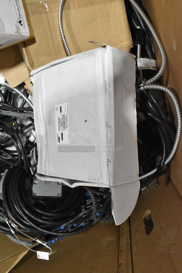 Pallet lot with Critical Cover AquaTank shoe covers and Wiremold CDBB1420C-40BK CD with outlet box, various wires.