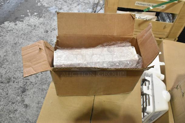 Box containing 8 various items including General Electric light fixtures, some wrapped in bubble wrap; Current Evolve LED series.