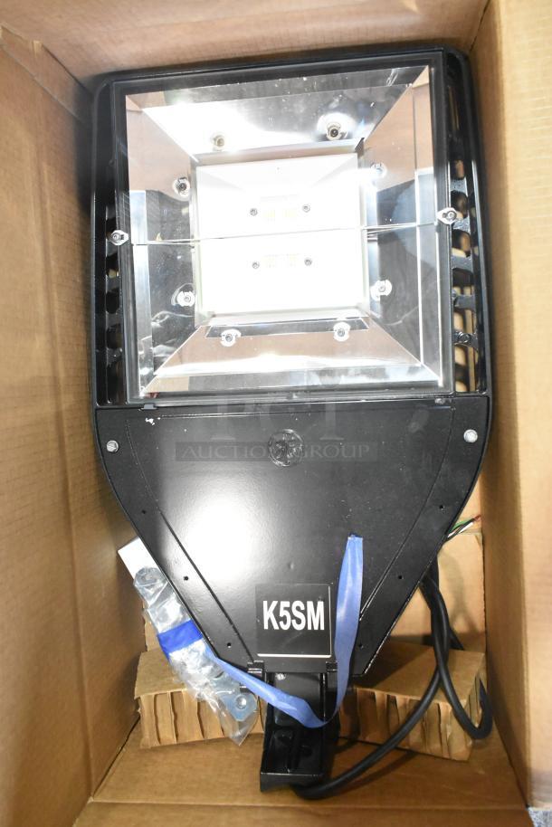 General Electric light fixture, Current Evolve LED Series, K5SM label, boxed, new condition. Auction includes 8 units.