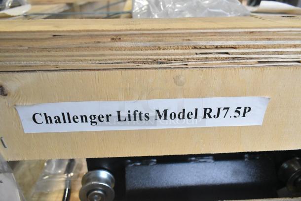 Brand new Challenger Lifts CL RJ7.5 rolling jack in crate, model RJ7.5P label visible. Ideal for 4 post car lifts.