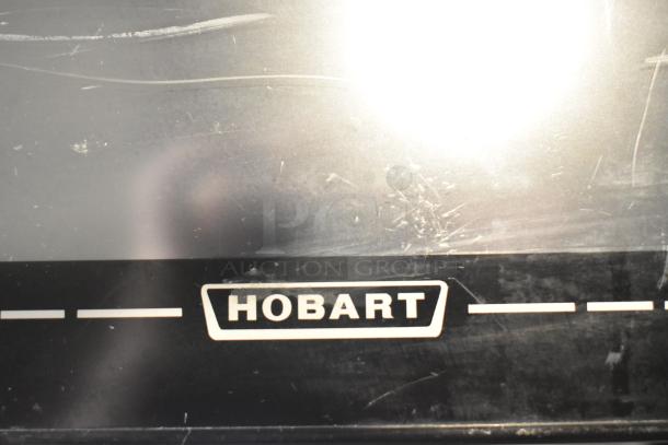 2019 Hobart HTi-LH3 metal countertop scale, label printer, 120/208-240V, 1 phase. Tested, working. Visible Hobart logo.