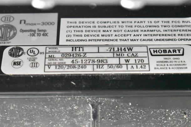 2023 Hobart HTi-7LH4W metal countertop scale with label printer, model shown with label details; 120/208-240 volts.
