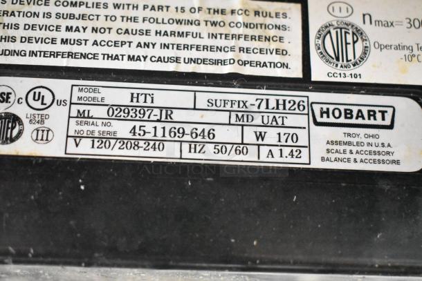 2017 Hobart HTi-7LH26 metal countertop scale label. Lists volts: 120/208-240, phase: 1, watt: 170, serial: 45-1169-646.