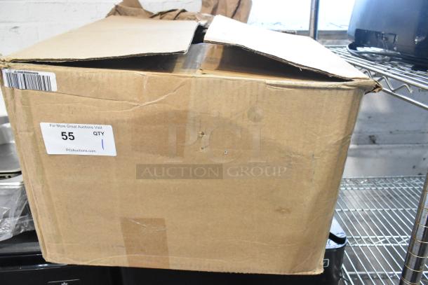 Cardboard box containing Volant Closed Box Air Intake System. Box is slightly damaged, with barcode and auction label visible.