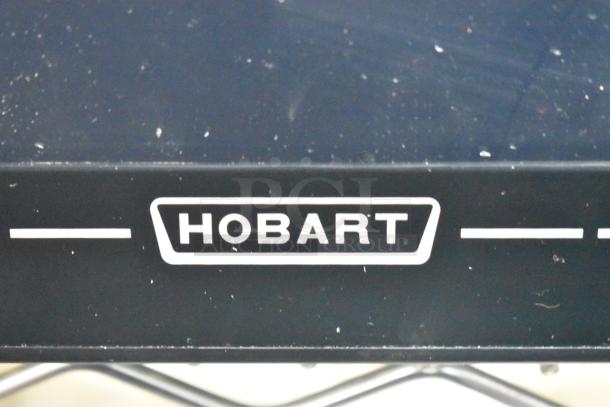 2017 Hobart HTi-7LH26 metal countertop scale with label printer; missing plate, non-functional, 120/208-240V, 1 phase.