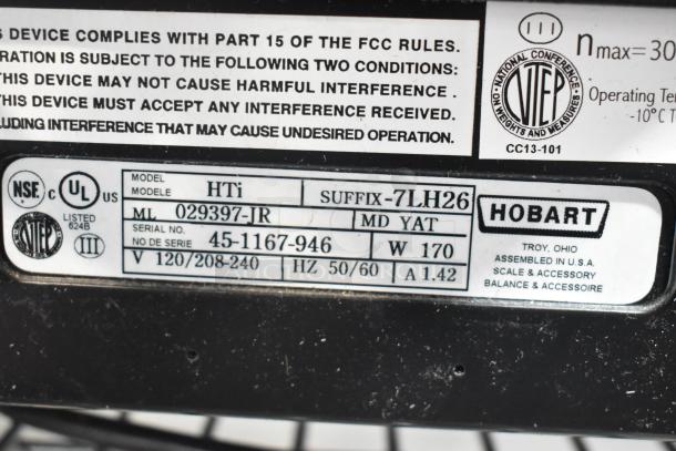 2017 Hobart HTi-7LH26 metal countertop scale with label printer, missing plate. Tested, does not power on. Voltage: 120/208-240V.