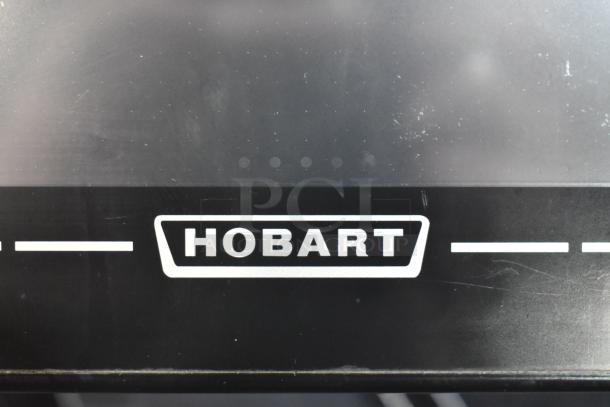 Hobart HTi-LH metal countertop scale with label printer. Missing plate and power cord, not tested. 120/208-240V, 1 phase.