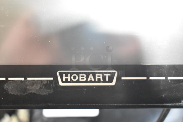 2024 Hobart HTi-7LH4W metal countertop scale with label printer; missing plate, not powering on; 120/208-240V, 1 phase.