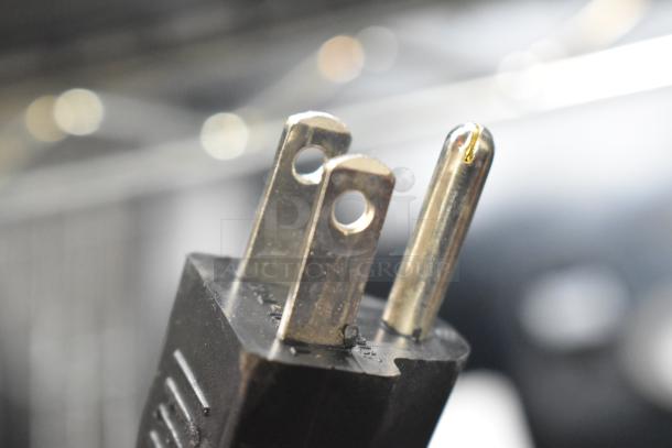 Close-up of power plug for Hobart HTi-7LH4W metal countertop scale, missing plate, tested but does not power on.