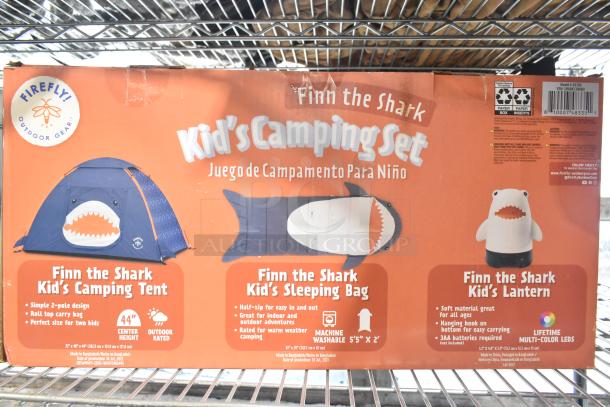 Finn the Shark Kid's Camping Set box with tent, sleeping bag, and lantern images. Includes product details and dimensions.