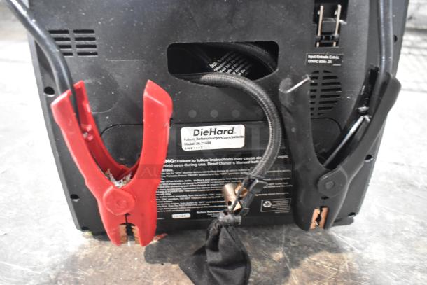 DieHard 1150 Portable Power Jump Starter with visible red and black clamps, label detailing patent info and model SWC 1432.3.