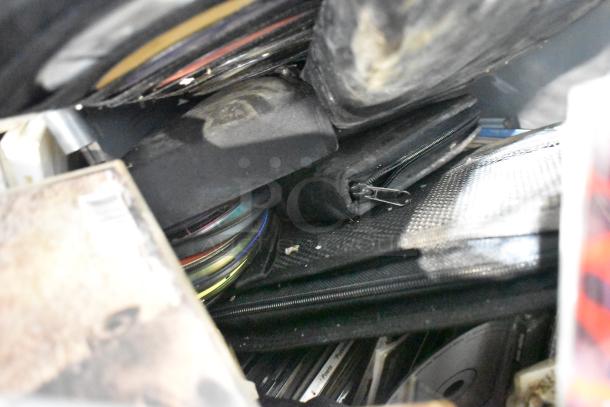 Tier lot including a portable DVD player, DVDs, assorted markers, tools, and an Amerex fire extinguisher. All items bundled.