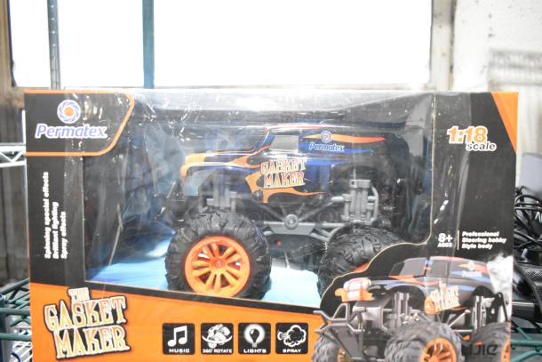 Permatex Gasket Maker toy in a box, 1:18 scale, with music, 360° rotation, lights, and spray effects; suitable for ages 8+.