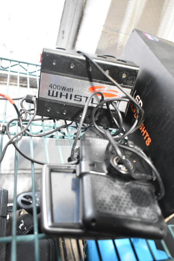 Tiered lot including a tool bag, tools, 400W Whistler power inverter, Permatex Gasket Maker, first aid kit, and HWStar LED headlights.