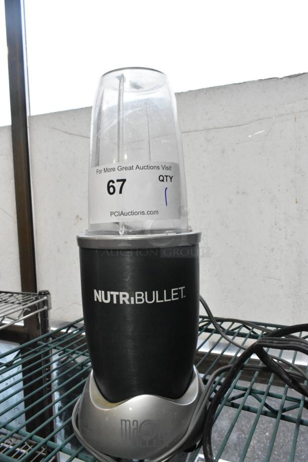 Nutribullet countertop blender, black, 115 volts, 1 phase, moderate condition with auction label 67.