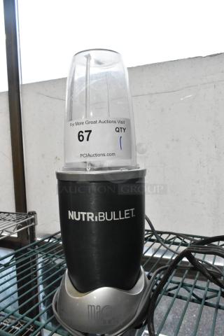 Nutribullet countertop blender, black, 115 volts, 1 phase, moderate condition with auction label 67.