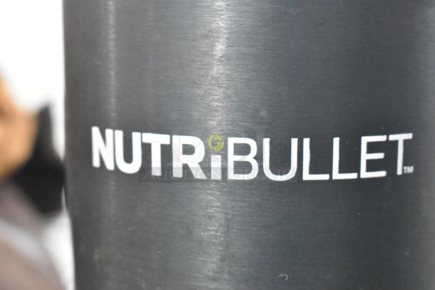 Nutribullet Countertop Blender, 115 volts, 1 phase, black finish, brand logo visible, in good condition.