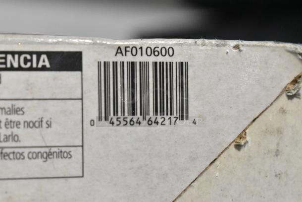 Bar code and label showing model number AF010600 on a CH Campbell Hausfeld 12 Volt Inflator packaging.