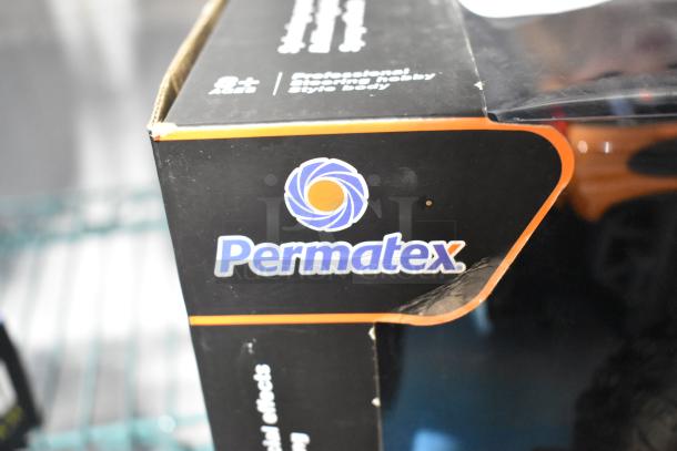 Close-up of Permatex box packaging, showing logo and text for ages 8+, professional crafting, and style body.