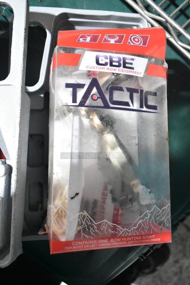 CBE Tactic bow hunting sight packaging, slightly worn, includes instructions. Part of mixed lot with tools and jumper cables.