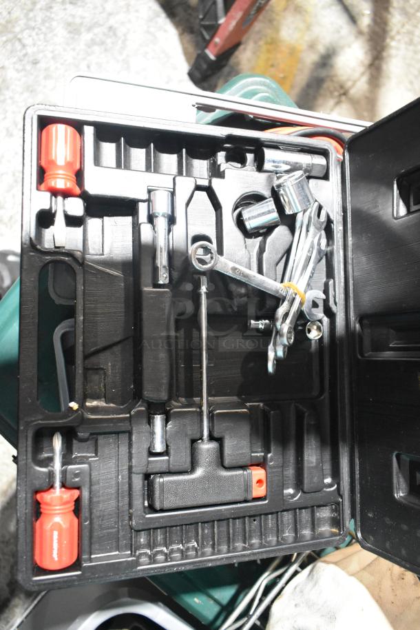 Tool set with various tools including pliers, screwdrivers, and sockets in black plastic case. Good condition.