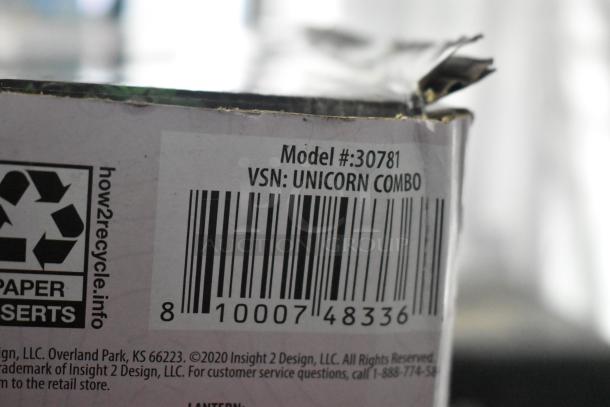 Barcode with text showing Model #30781, VSN: UNICORN COMBO, and recycle instructions on a product box.