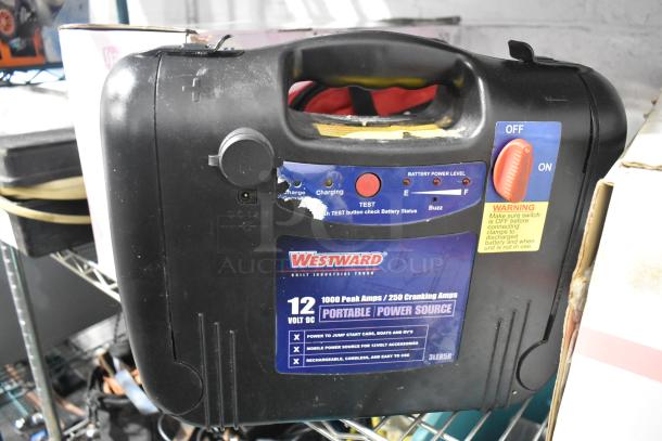 Westward portable power source, 12V DC, 1000 peak amps, 250 cranking amps. Features include charging indicator, test button, and on/off switch. Condition: used.
