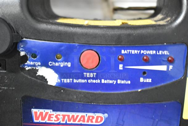 Westward power source with charge indicators and test button, slight wear on label.