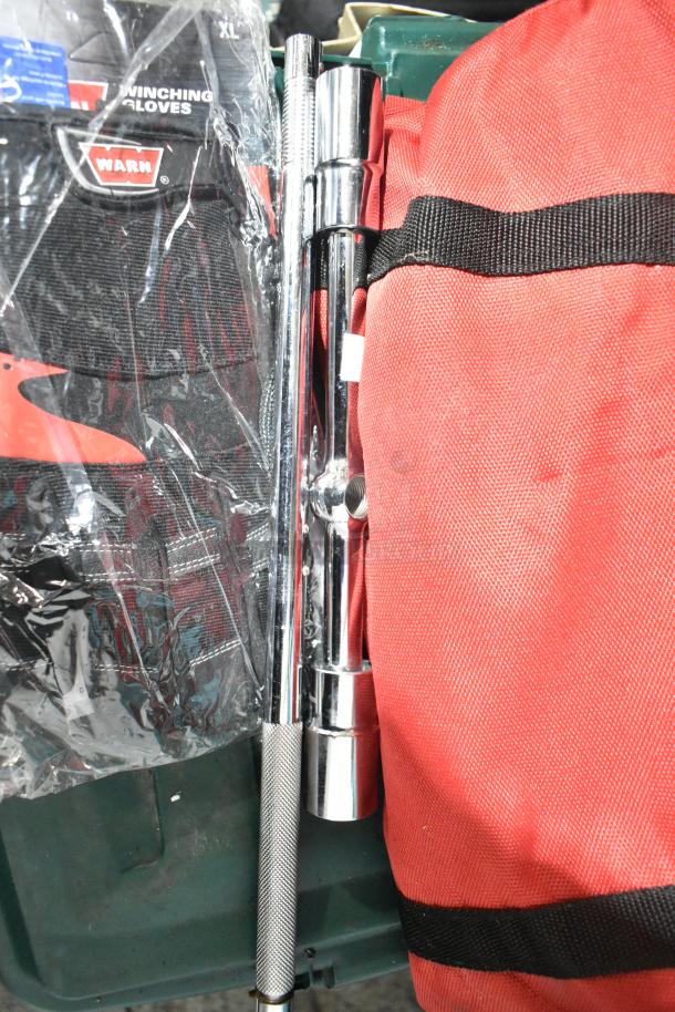 Tier lot containing Warn winching gloves, chrome tools, and a red bag. Items appear new with packaging intact.