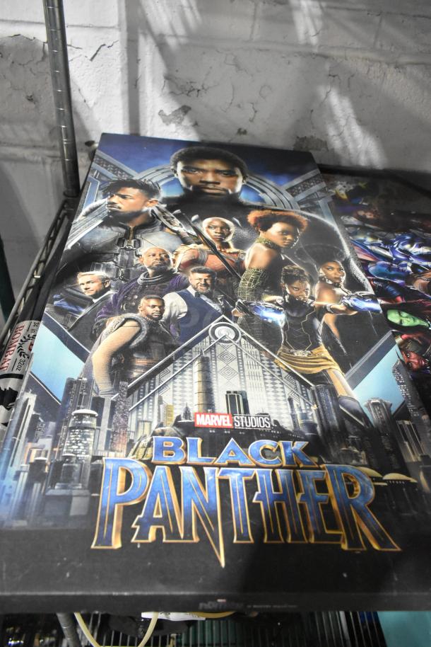 Marvel Studios Black Panther poster, showcasing main characters. Condition appears good. Part of mixed auction lot.