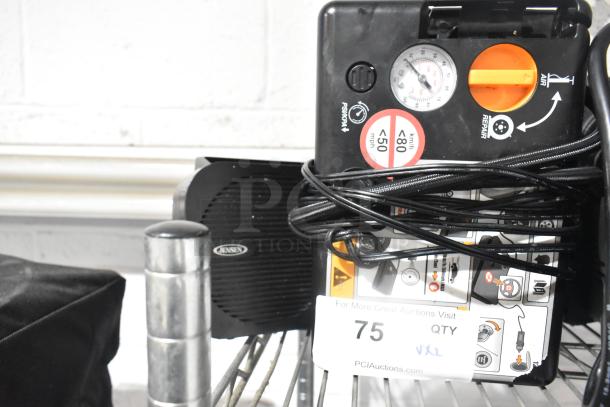 Jensen radio and air compressor, wires coiled, in good condition. Auction lot number 75 visible on tag.