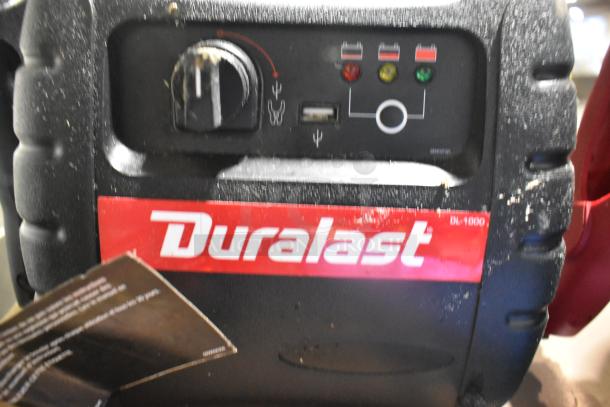 Duralast jumper with DL-1000 model, visible control panel, and LED indicators, slightly worn condition.