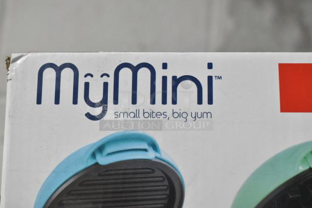 MyMini waffle maker box with "small bites, big yum" slogan. Slightly worn edges. Part of a mixed auction lot.